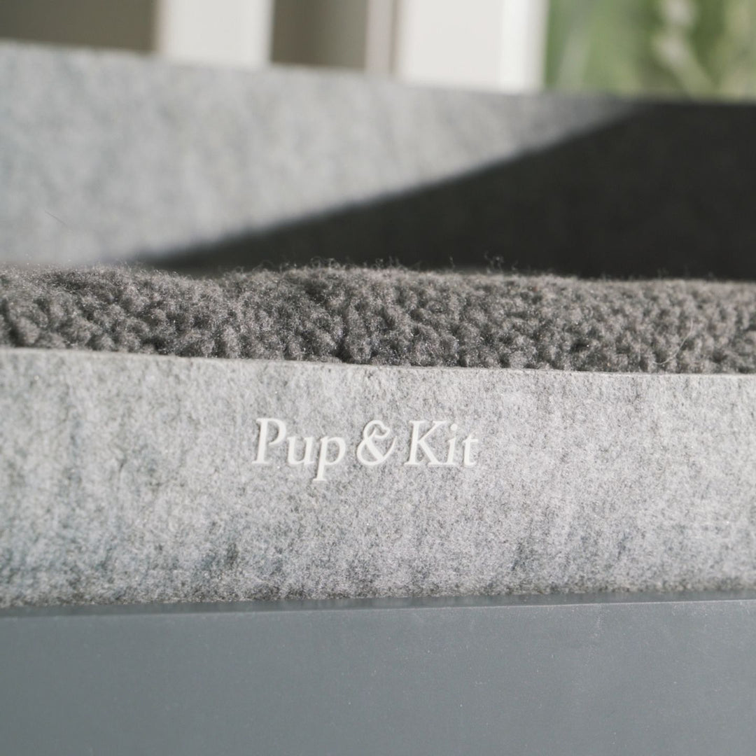 PetNest & Raised Stand Slate Close Up Logo#mattress-colour_slate-grey